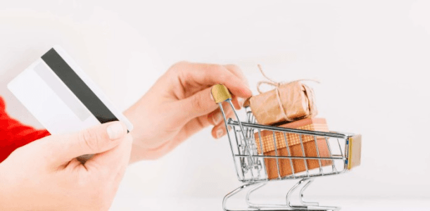 Image of a credit card and mini shopping cart